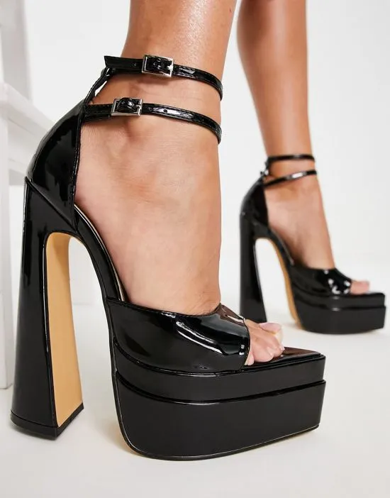 https://images.styletyx.com/images/ego-marshall-double-platform-sandals-with-ankle-strap-in-black-ego-2448415_1.webp