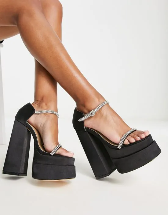 https://images.styletyx.com/images/ego-peggy-platform-heel-sandals-with-embellished-straps-in-black-ego-3037636_4.webp