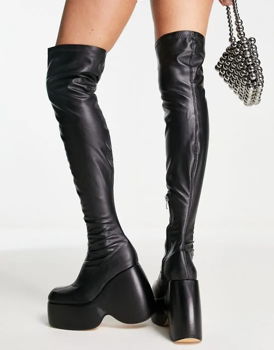 https://images.styletyx.com/images/ego-popstar-chunky-platform-over-the-knee-boots-in-black-ego-13253637_2.webp