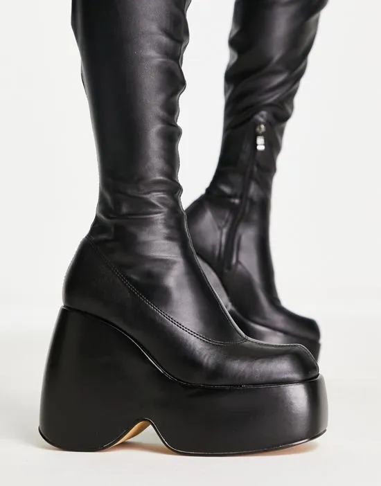 https://images.styletyx.com/images/ego-popstar-chunky-platform-over-the-knee-boots-in-black-ego-13253637_3.webp