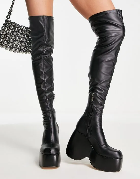 https://images.styletyx.com/images/ego-popstar-chunky-platform-over-the-knee-boots-in-black-ego-13253637_4.webp