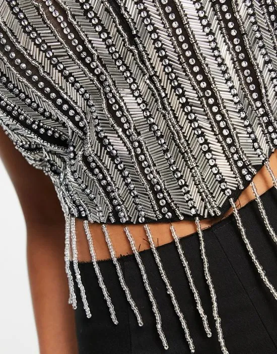 https://images.styletyx.com/images/embellished-halter-top-with-fringing-in-black-asos-design-3237571_3.webp