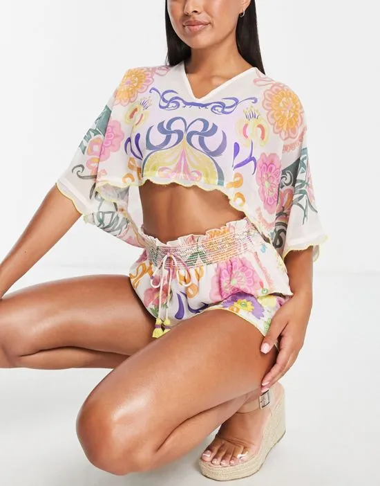 https://images.styletyx.com/images/embroidered-kimono-crop-beach-top-in-bright-pink-part-of-a-set-river-island-1004336550_4.webp