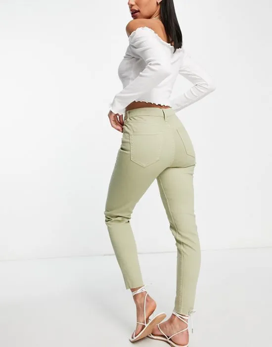 https://images.styletyx.com/images/emily-high-rise-skinny-jeans-in-khaki-miss-selfridge-2489837_2.webp
