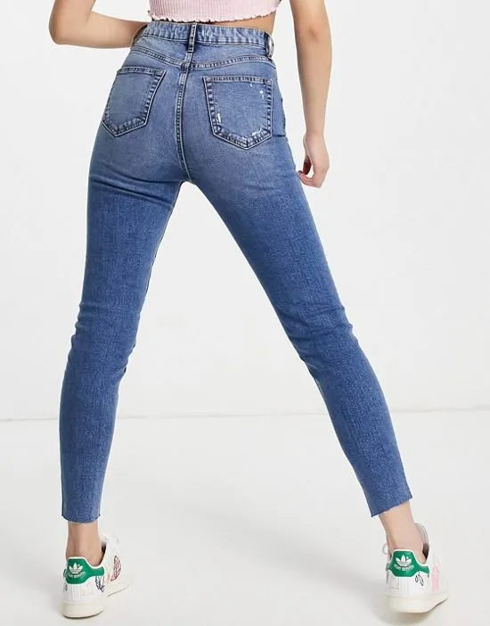 https://images.styletyx.com/images/emily-high-waist-ankle-grazer-skinny-jean-in-midwash-blue-miss-selfridge-2940178_2.webp