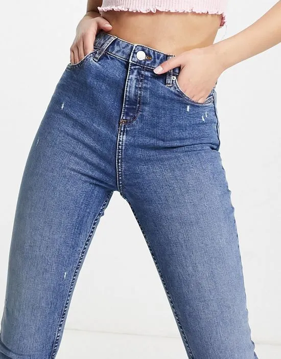 https://images.styletyx.com/images/emily-high-waist-ankle-grazer-skinny-jean-in-midwash-blue-miss-selfridge-2940178_4.webp