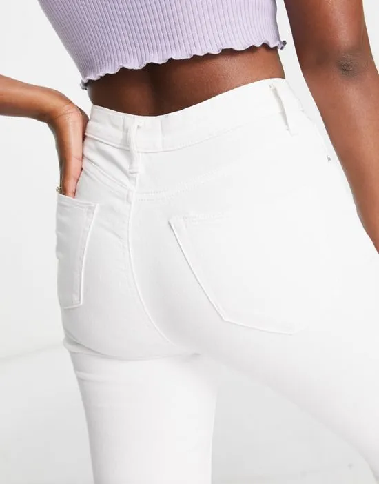 https://images.styletyx.com/images/emily-high-waist-ankle-grazer-skinny-jeans-in-white-miss-selfridge-2834422_4.webp