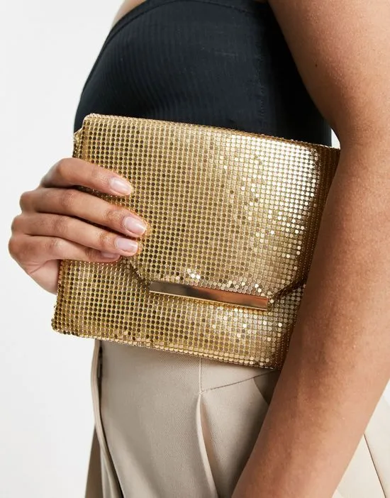 https://images.styletyx.com/images/envelope-clutch-bag-in-muted-gold-true-decadence-1876152_3.webp