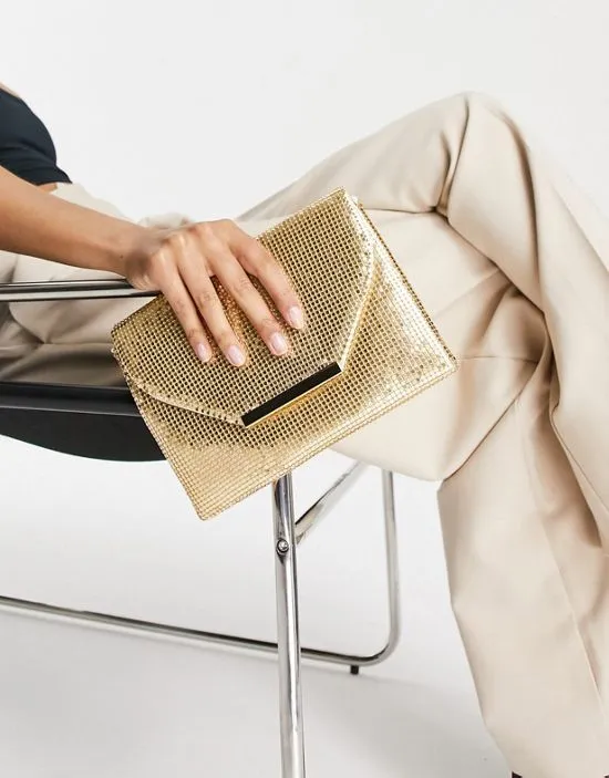 https://images.styletyx.com/images/envelope-clutch-bag-in-muted-gold-true-decadence-1876152_4.webp