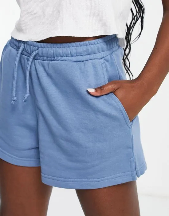 https://images.styletyx.com/images/essence-cotton-jersey-shorts-in-blue-weekday-2341704_4.webp