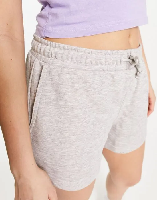 https://images.styletyx.com/images/essence-jersey-shorts-in-gray-heather-exclusive-to-asos-weekday-1154924410_3.webp