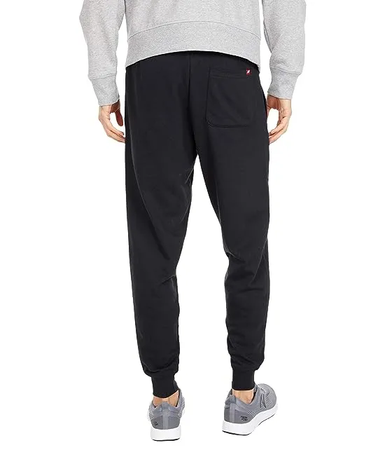 https://images.styletyx.com/images/essentials-stacked-logo-sweatpants-new-balance-2002766_3.webp