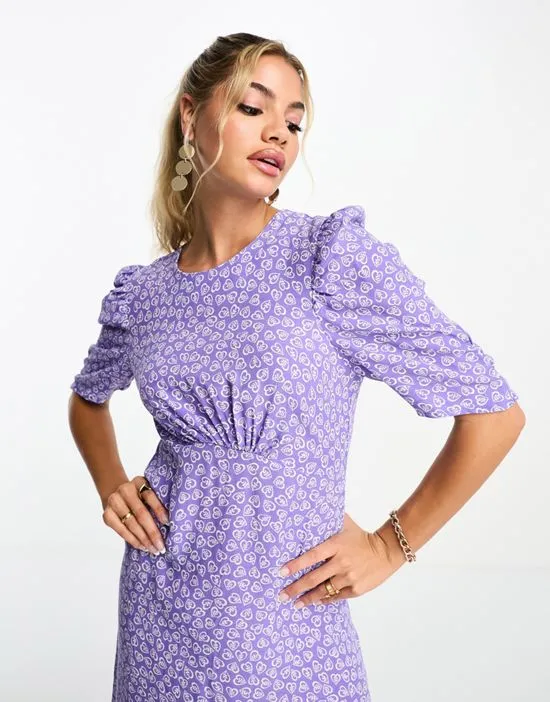 https://images.styletyx.com/images/evie-midi-dress-in-purple-heart-print-nobody-s-child-1004060819_3.webp