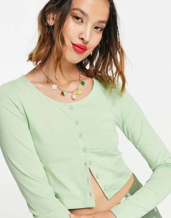 https://images.styletyx.com/images/exclusive-cardigan-in-mint-part-of-a-three-piece-set-noisy-may-13319029_2.webp