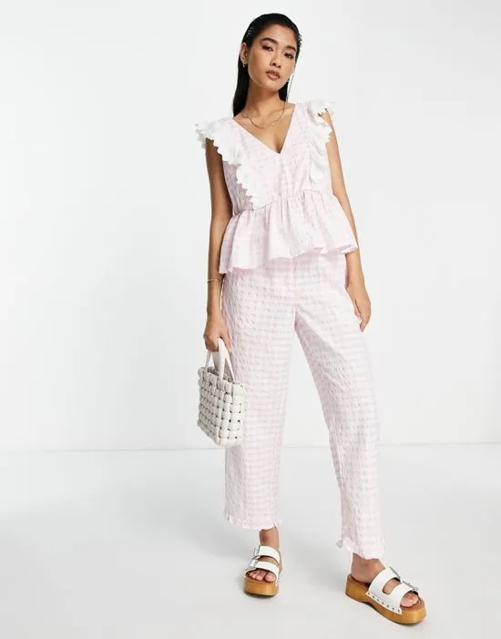 https://images.styletyx.com/images/exclusive-gingham-fril-top-in-pink-part-of-a-set-y-a-s-1882279_4.webp