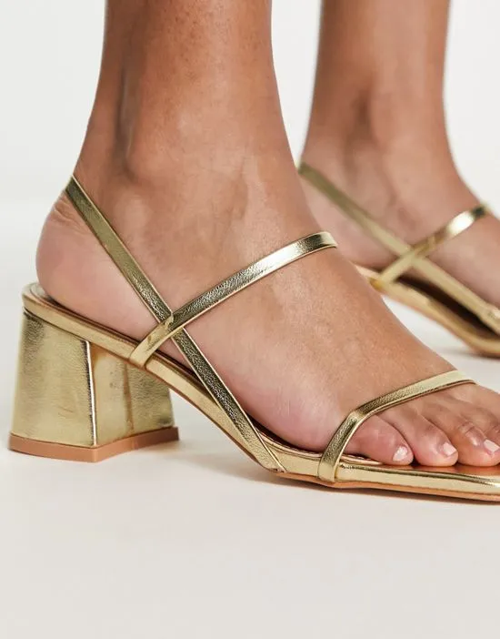 https://images.styletyx.com/images/exclusive-just-realise-strappy-mid-heel-sandals-in-gold-public-desire-13315437_2.webp