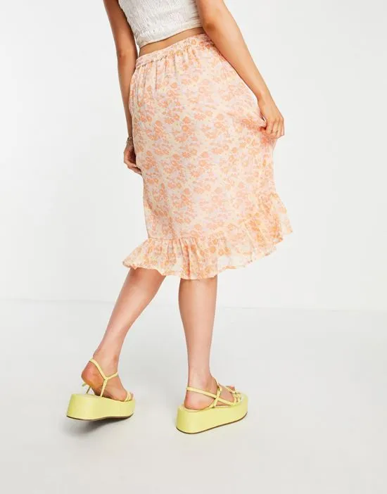 https://images.styletyx.com/images/exclusive-ruffle-wrap-mini-skirt-in-orange-ditsy-floral-jdy-2020071_3.webp