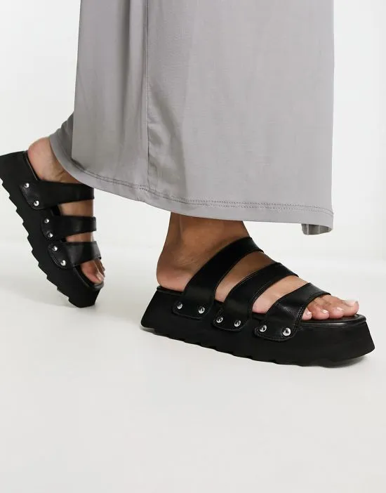 https://images.styletyx.com/images/exclusive-sabian-3-strap-chunky-sandal-slides-in-black-leather-asra-871690120_4.webp