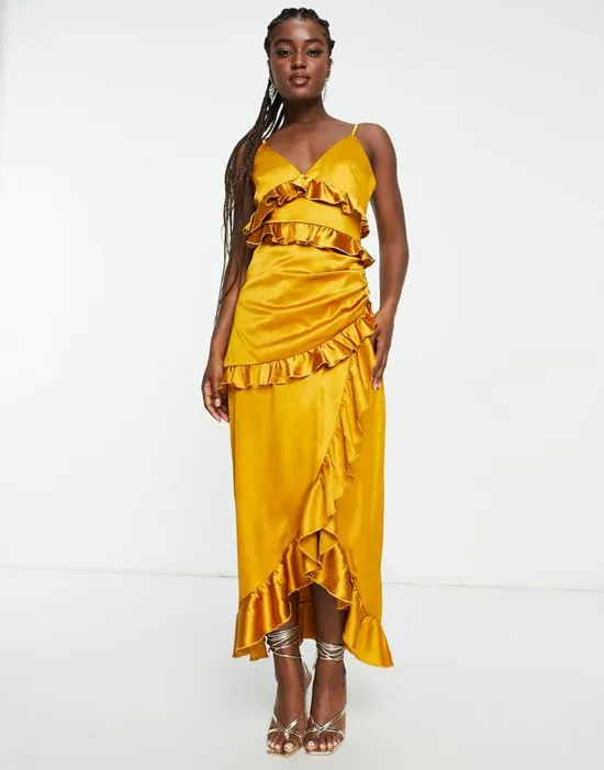 https://images.styletyx.com/images/exclusive-satin-asymmetric-ruffle-detail-maxi-dress-in-ochre-in-the-style-3127081_1.webp