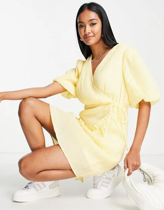 https://images.styletyx.com/images/exclusive-textured-mini-dress-with-ruffle-seam-detail-in-pastel-yellow-vila-1823178_4.webp
