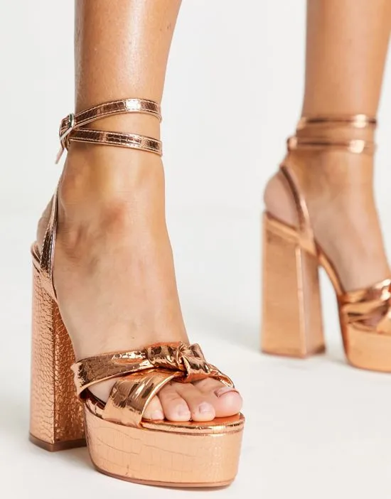 https://images.styletyx.com/images/exclusive-verona-platform-high-heel-sandals-in-rose-gold-public-desire-3112681_4.webp