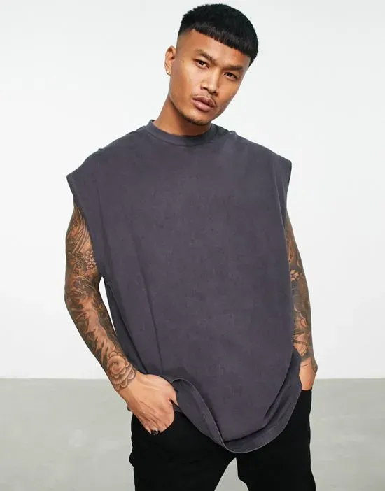 https://images.styletyx.com/images/extreme-oversized-tank-top-in-washed-black-topman-1910463_1.webp