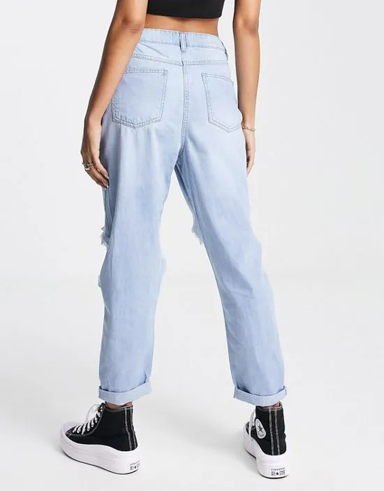 https://images.styletyx.com/images/extreme-rip-jeans-in-light-blue-parisian-13285854_3.webp