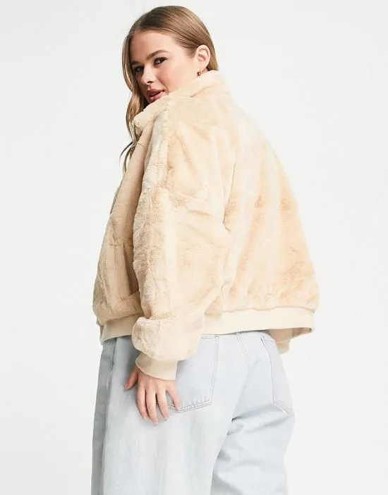 https://images.styletyx.com/images/faux-fur-bomber-jacket-in-tan-tan-missguided-plus-2595002_2.webp