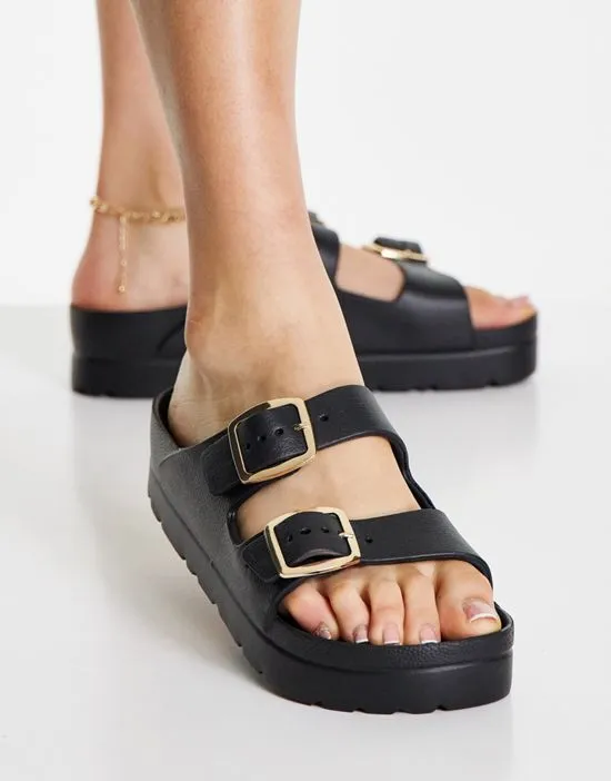 https://images.styletyx.com/images/fawn-flatform-jelly-mules-in-black-asos-design-1740104_2.webp
