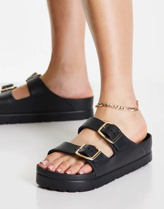 https://images.styletyx.com/images/fawn-flatform-jelly-mules-in-black-asos-design-1740104_3.webp