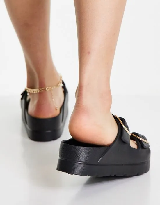 https://images.styletyx.com/images/fawn-flatform-jelly-mules-in-black-asos-design-1740104_4.webp