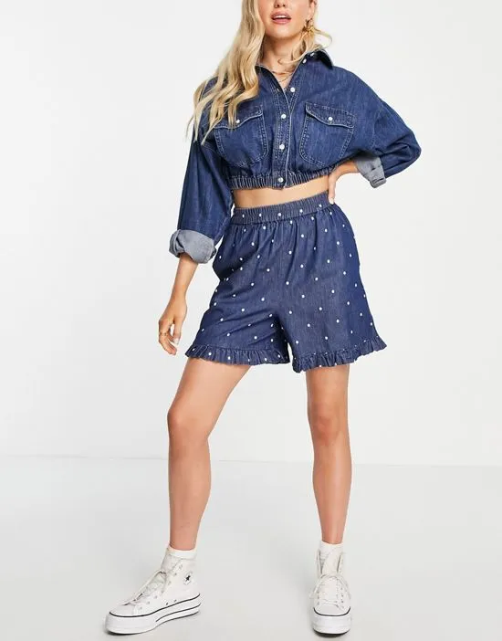 https://images.styletyx.com/images/femme-cotton-shorts-with-ruffle-hem-in-dot-print-selected-2482491_4.webp