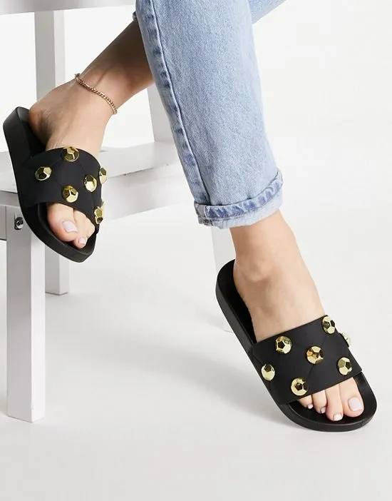 https://images.styletyx.com/images/finery-quilted-studded-slides-in-black-asos-design-1738994_1.webp