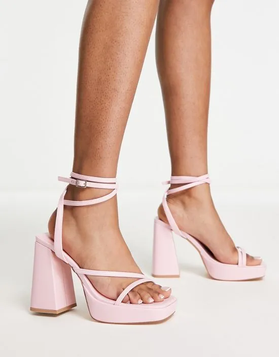 https://images.styletyx.com/images/flare-heeled-platform-sandals-in-light-pink-london-rebel-wide-fit-873745766_4.webp