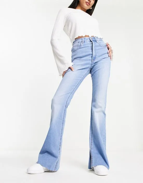 https://images.styletyx.com/images/flare-jean-with-side-slit-in-light-blue-stradivarius-13292858_1.webp