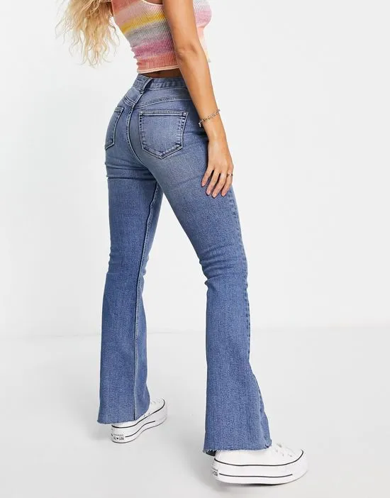 https://images.styletyx.com/images/flare-jeans-in-mid-wash-miss-selfridge-12998987_2.webp