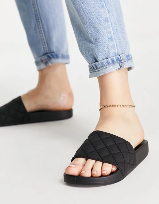 https://images.styletyx.com/images/flare-quilted-sliders-in-black-asos-design-1739304_1.webp