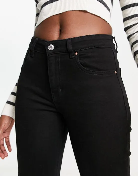 https://images.styletyx.com/images/flared-jeans-with-split-hem-detail-in-black-mango-12998932_4.webp
