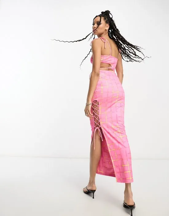 https://images.styletyx.com/images/flash-check-print-lattice-detail-maxi-dress-in-muted-pink-annorlunda-13209373_2.webp