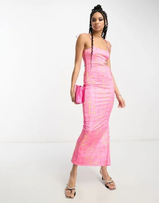 https://images.styletyx.com/images/flash-check-print-lattice-detail-maxi-dress-in-muted-pink-annorlunda-13209373_4.webp