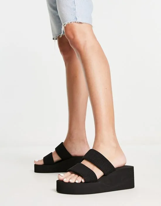 https://images.styletyx.com/images/flatform-mule-sandals-in-black-truffle-collection-wide-fit-873868522_2.webp