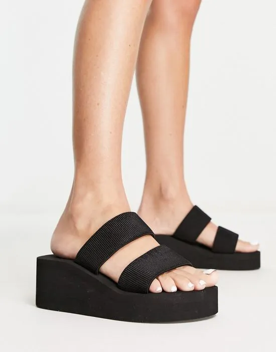 https://images.styletyx.com/images/flatform-mule-sandals-in-black-truffle-collection-wide-fit-873868522_3.webp