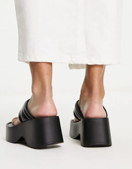 https://images.styletyx.com/images/flatform-toe-thong-sandals-in-black-london-rebel-wide-fit-13315874_2.webp