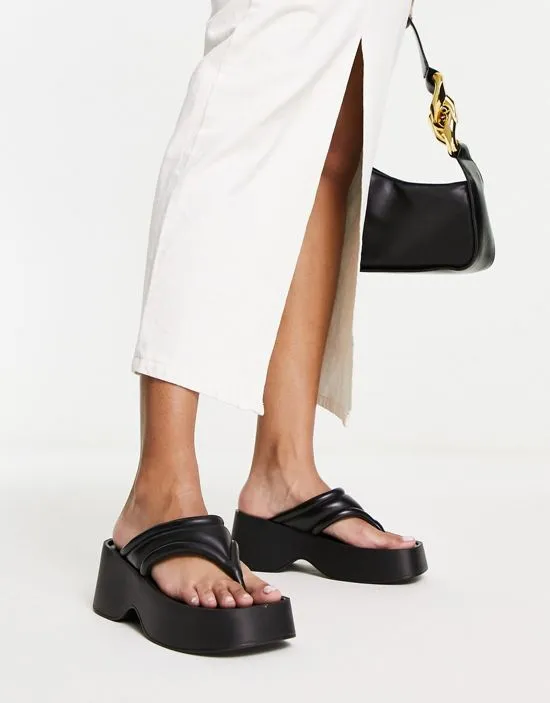 https://images.styletyx.com/images/flatform-toe-thong-sandals-in-black-london-rebel-wide-fit-13315874_4.webp
