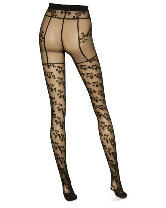 https://images.styletyx.com/images/floral-suspender-tights-wolford-13207695_5.webp