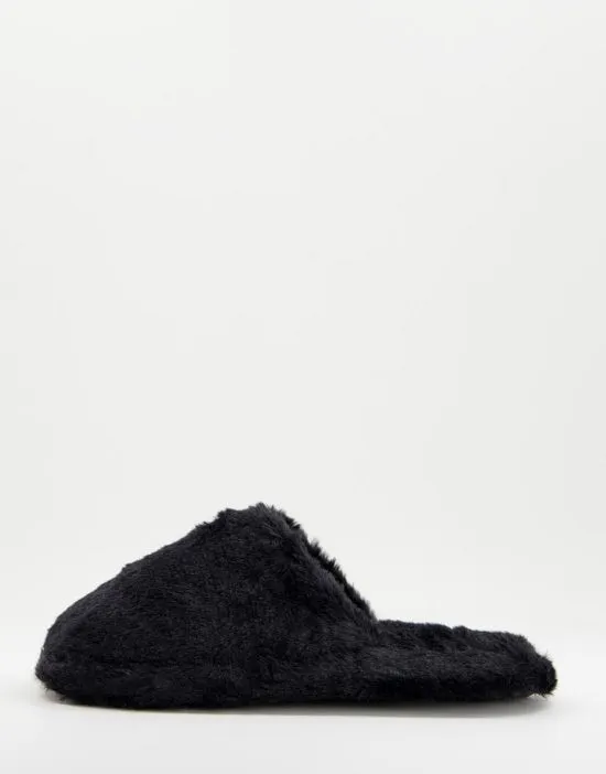 https://images.styletyx.com/images/fluffy-mule-slipper-in-black-truffle-collection-1945862_1.webp