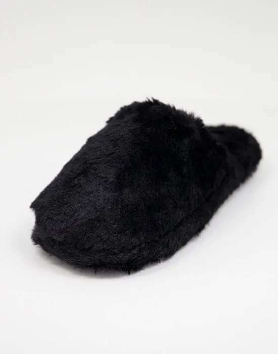 https://images.styletyx.com/images/fluffy-mule-slipper-in-black-truffle-collection-1945862_2.webp