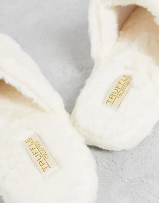 https://images.styletyx.com/images/fluffy-open-toe-slippers-in-cream-truffle-collection-2772025_3.webp