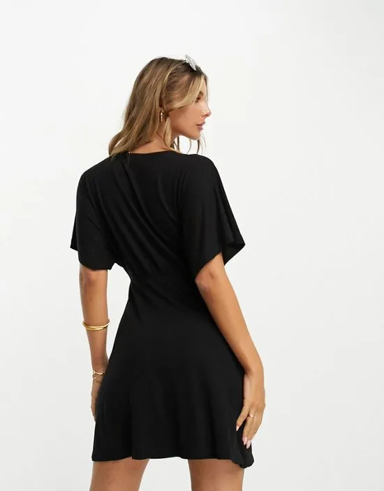 https://images.styletyx.com/images/flutter-sleeve-mini-tea-dress-with-buttons-in-black-asos-design-13207971_3.webp