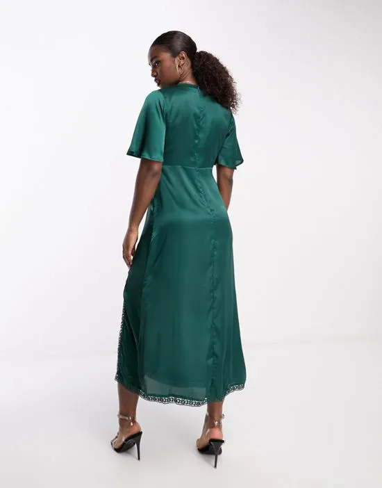 https://images.styletyx.com/images/flutter-sleeve-v-neck-midi-dress-with-lace-trim-in-forest-green-influence-13140400_2.webp